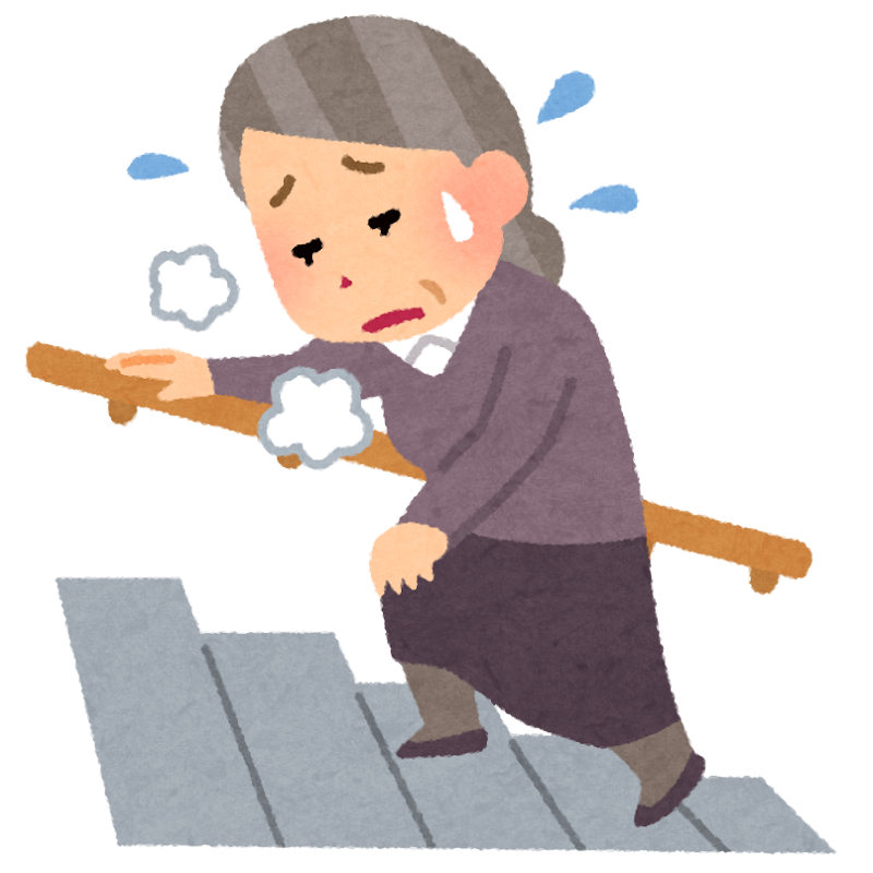 階段を慎重に降りる中高年の女性