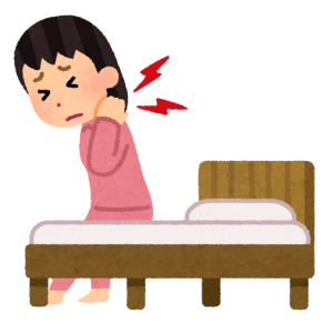 朝起きて首の痛みに驚く人のイメージ